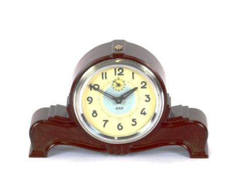 A Jaz Bakelite cased mantel clock, with alarm movement