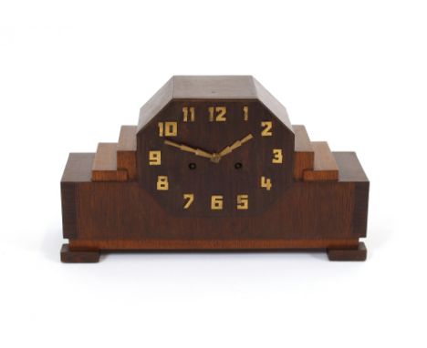 An oak cased Art Deco mantel clock, of Odeonesque shape