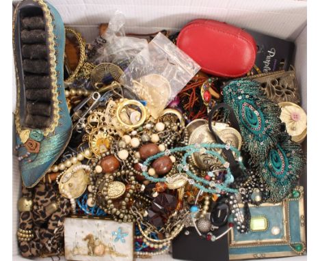 A large quantity of various costume jewellery;&nbsp;a shoe shaped ring stand; various trinket boxes etc.