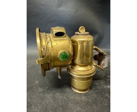 A Joseph Lucas Calcia Club brass acetyphote lamp model 143.