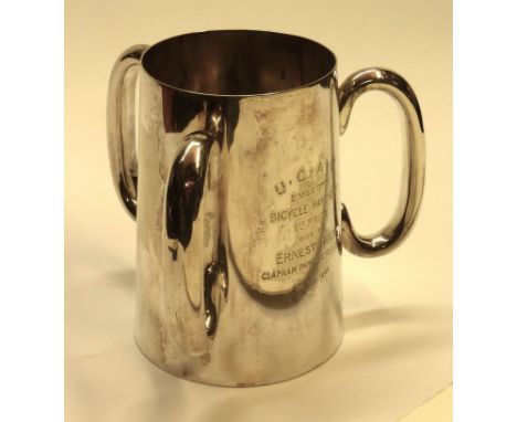 A Tyg - a three-handled silver plated trophy by Mappin &amp; Webb, engraved U.C.A.C Two Mile Open Handicap' - 'First Prize Wo
