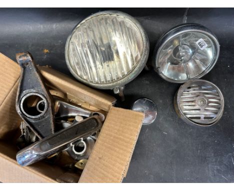 A Notec centre lamp, a Lucas FT37 and an atelete chrome horn cover front and rear cover.  