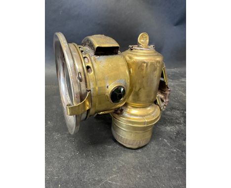A Joseph Lucas Calcia Club brass acetyphote lamp model 143.