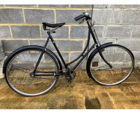 A lady's Triumph bicycle with Brooks saddle.