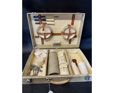 A Sirram picnic case with ceramic crockery (six setting) and one other.