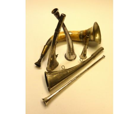 A Parkers bicycle bugle and five other types to include an assayed silver post-horn style example (6).