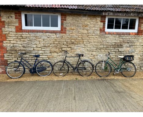 Three bicycles: a Marlboro Woodstock with Brooks saddle, a Rudge Whitworth and a Triumph. 