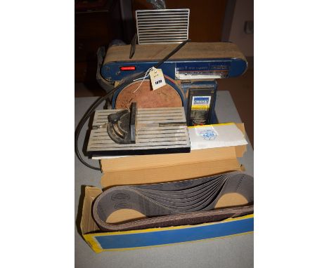A Draper belt and disc sander, model No. BDS368, together with a box of spare belts.
