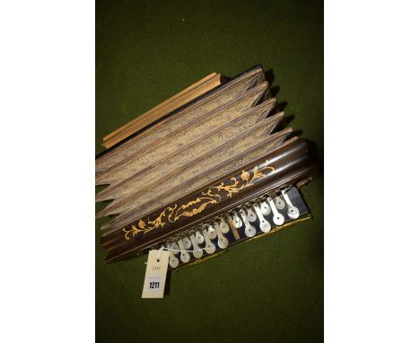 A late 19th Century inlaid accordion with mother-of-pearl finger keys.
