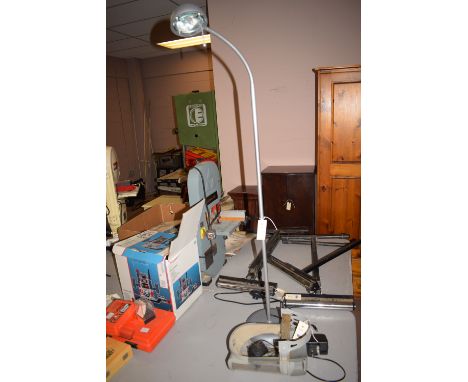 A protective face guard with perspex cover and rechargeable battery operated dust extractor; together with a floor-standing a