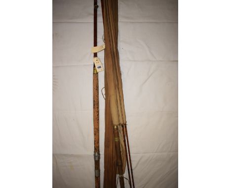 A Hardy Brothers Alnwick serial no. B15603 steel centred three-piece split cane double handed salmon rod; together with a Har