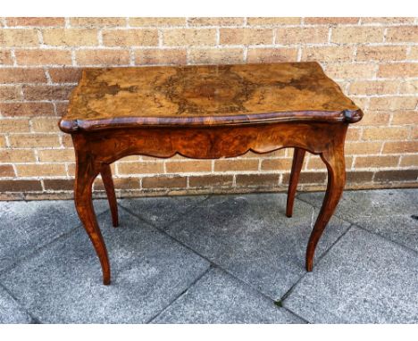 A VICTORIAN BURR WALNUT VENEERED CARD TABLE  on cabriole supports, 92cm wide 71cm high Condition Report : generally good, rep