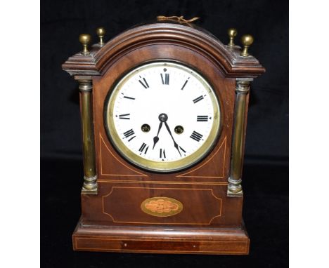 AN EDWARDIAN MAHOGANY CASED MANTLE CLOCK  with inlaid decoration, the 8-day French movement striking on a coiled gong, 30cm h