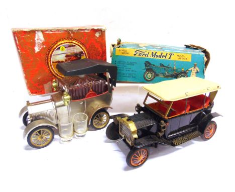 A SUNRISE TOYS NIHONKOGEI (JAPAN) TINPLATE BATTERY-OPERATED FORD MODEL T  black with a removable cream roof, generally good c