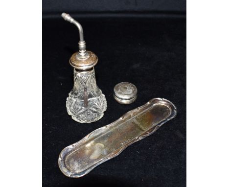 A SILVER TOPPED ATOMIZER, PILL BOX AND PIN TRAY The silver topped atomizer with cut glass body, marked Sterling silver (sold 