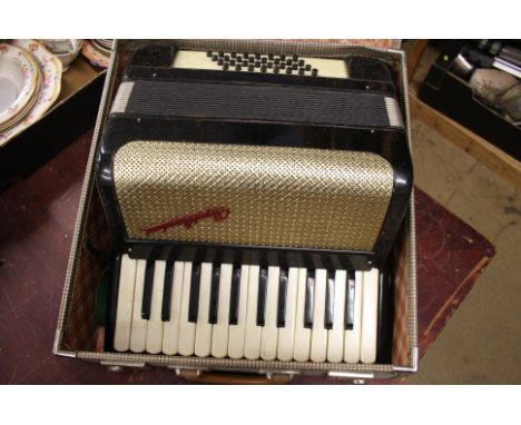 An accordion and case.