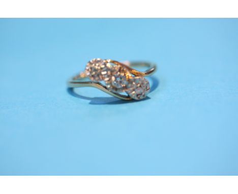 A three stone diamond ring.