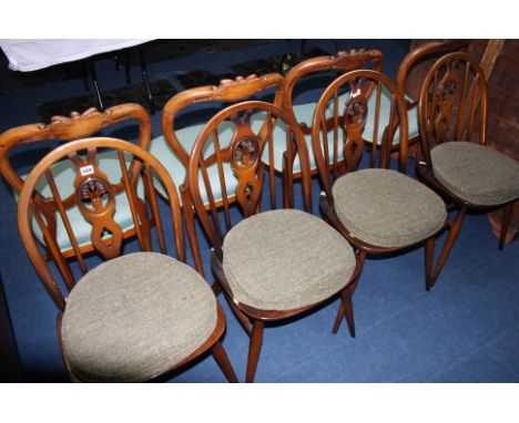 A set of four Ercol Windsor chairs.