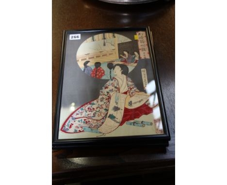 Three framed Japanese prints.
