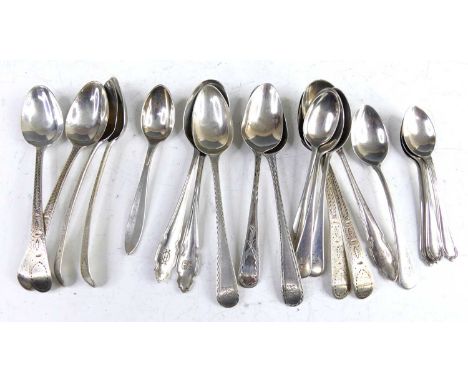 A collection of George III and later silver teaspoons, six being bright-cut engraved with mongorammed terminals and geometric