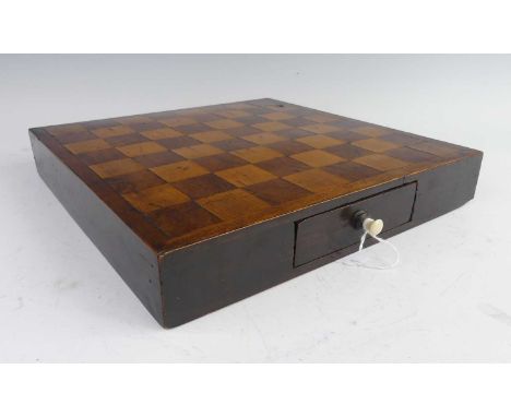 An early 19th century rosewood and satinwood travelling chessboard, with frieze drawer, w.32.5cmBoard measures 32.5 x 32.5 x 