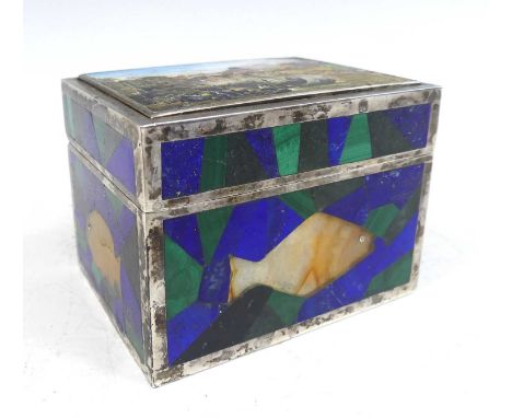 An early 20th century Russian silver, lapis lazuli and malachite set trinket box, of deep rectangular form, the hinged cover 