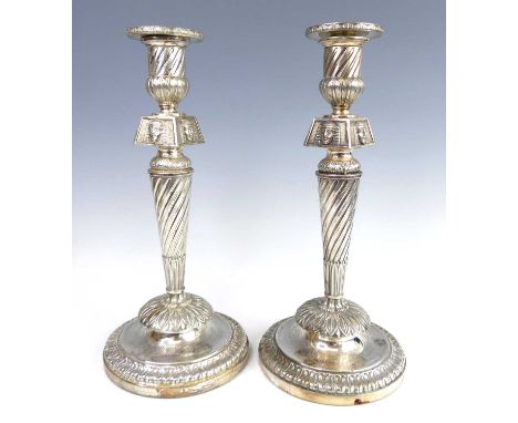 A pair of Jane Austen and Napoleonic War interest George III silver Egyptian Revival commemorative table candlesticks, each o