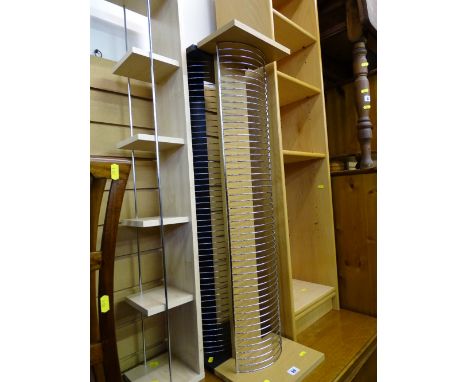 Three CD racks and an open light wood effect multi-use bookcase