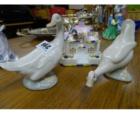 Two Nao geese and a Coalport country cottage