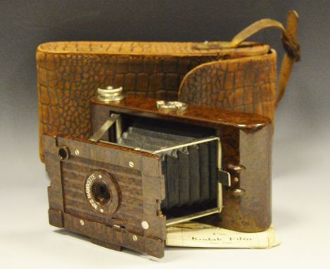 A Besdale Hawkette bakerlite bellows camera and bag