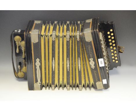 A Chromatic Accordian, steel bronze reeds