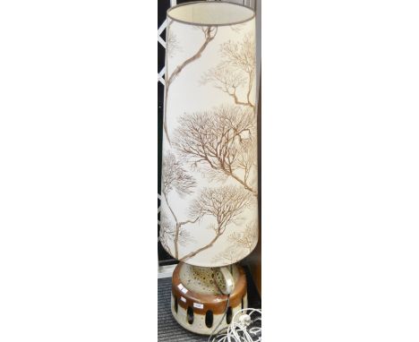 A mid 20th century retro studio pottery lamp with substantial light shade