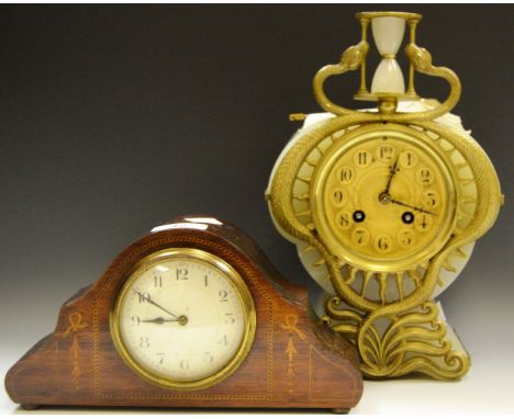 An Art Nouveau onyx and gilt mantel clock; an early 20th century mahogany mantel clock (2)
