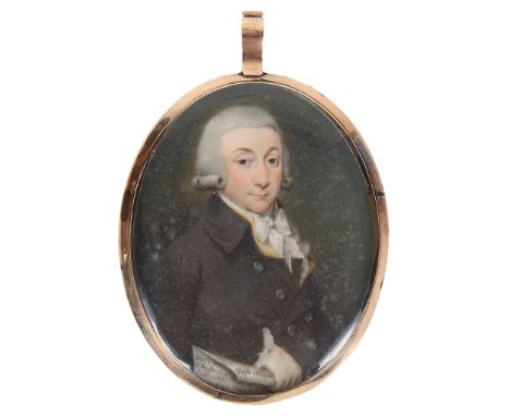 Circle of Abraham Daniel (British, c. 1750-1806):A portrait miniature of a gentleman in a brown jacket, holding a hand-writte