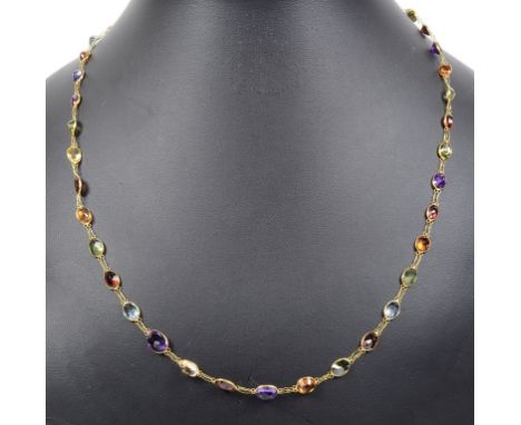 A 14ct Mixed Stone Necklace:Set along the length of the necklace, in single row, set with amethyst, peridot, garnet, topaz et