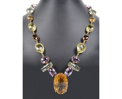 A Heavy 18ct Abstract Mixed Stone Necklace:Comprising large honey topaz, topaz peridot, amethyst and garnets, symmetrical for