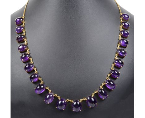 An 18ct Cabochon Amethyst Necklace:Comprising 21 graduated claw set amethysts