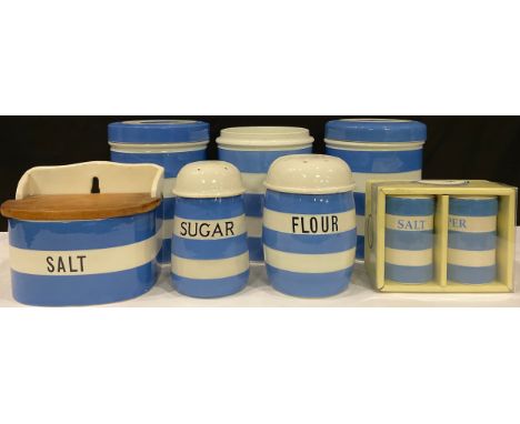 A T G Green Cornish Ware salt box, hinged wooden cover, a flour and a sugar dredger, three cylindrical storage jars; an assoc