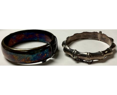 A silver bangle, Birmingham 1967, boxed; another, Birmingham 1971 (2) 