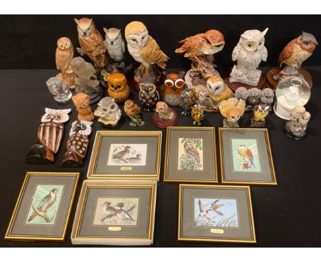 A Leonardo ceramic model, Tawny Owl, 18cm, circular wooden base; others, Barn Owls; a Regency Fine Arts resin miniature Barn 