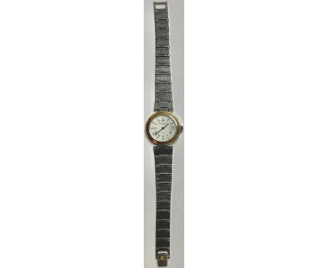 A Baume and Mercier wristwatch, Roman numerals, stainless steel articulated strap  Provenance: From Eugenia Charles, Prime Mi
