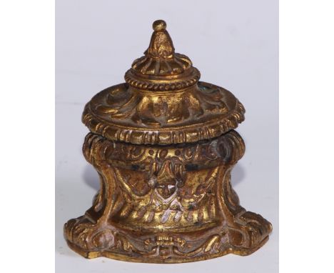 A 19thC ormolu inkwell, cast overall with masks and swags, scroll feet, 8.5cm high, c.1870 (lacks glass liner) 