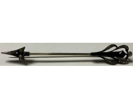 An Art Deco silver and paste arrow bar brooch, set with blue and clear stones, 8cm, marked 935, boxed 