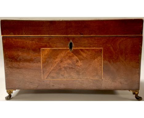 A George III mahogany tea caddy, holly inlay, paw feet 