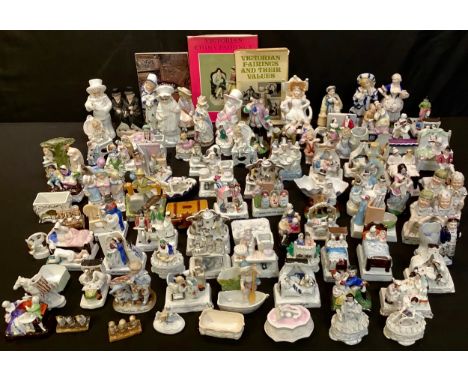 An interesting collection of 19th century Staffordshire and continental porcelain fairings, including, Lor Three Legs I'll Ch