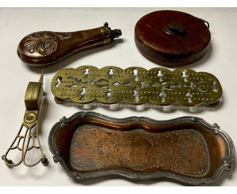 A George III copper powder flask; candle wick trimmers; a brass crib board; a leather cased tape measure, 100ft (4) 