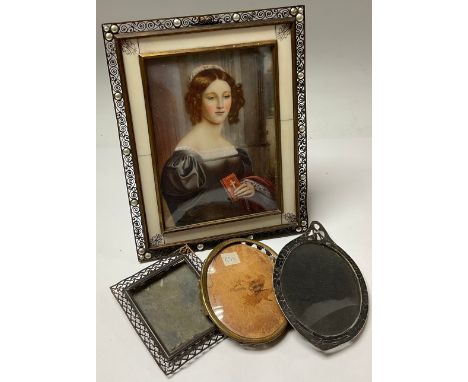 A 20th century rectangular gilt metal and ivorine easel frame, set with 'pearls' to angles, 19cm x 15cm;  a print on ivorine,
