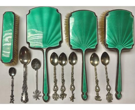 An emerald enamel dressing table set; a quantity of silver coloured metal teaspoons, some marked Sterling 