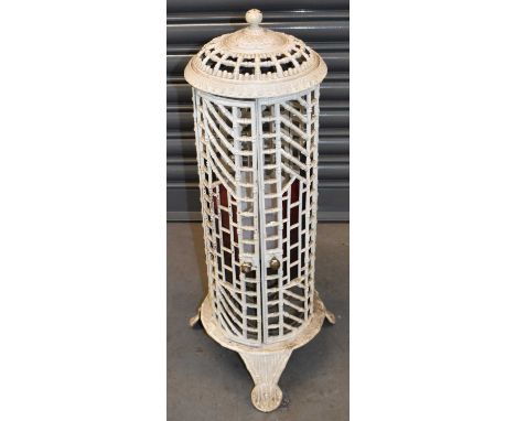 A French white painted cast iron stove/lamp, height 75cm.