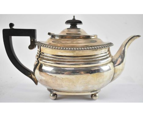 GOLDSMITH &amp; SILVERSMITH CO LTD; a George V hallmarked silver teapot, London 1929, 22.6ozt/705g.